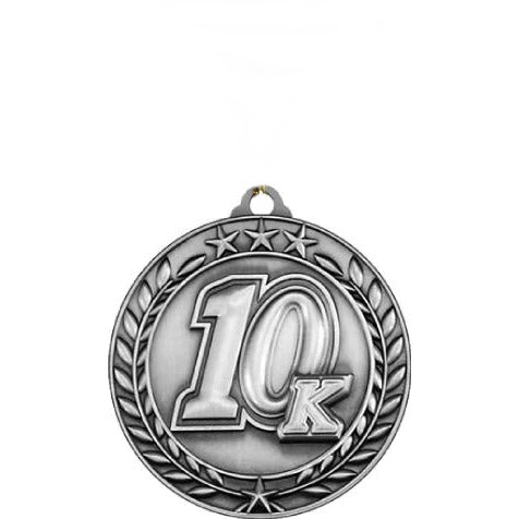 Silver antique Qualicast 10K medallion with wreath and stars design.