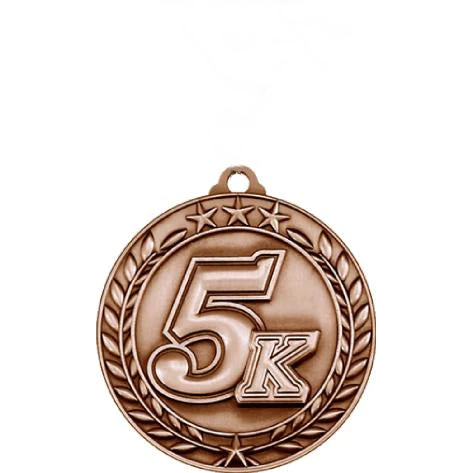 Bronze antique Qualicast medallion with "5K" in the center, surrounded by a wreath and three stars.