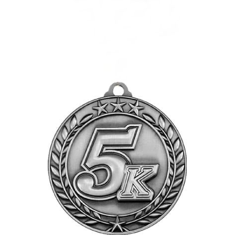 Silver antique Qualicast medallion with "5K" in the center, surrounded by a wreath and three stars.