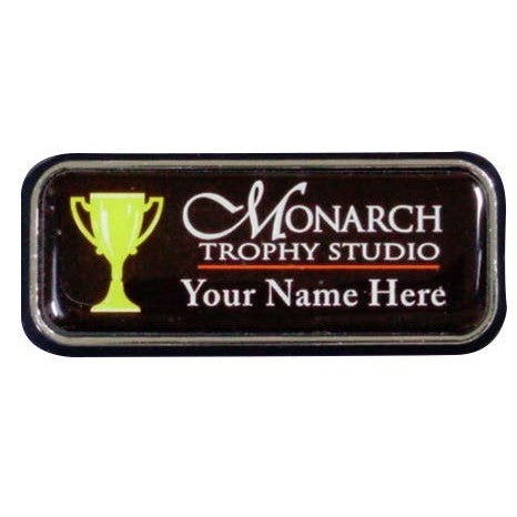 1"x3" full color epoxy dome name badge with a black frame, featuring a gold trophy and white text.