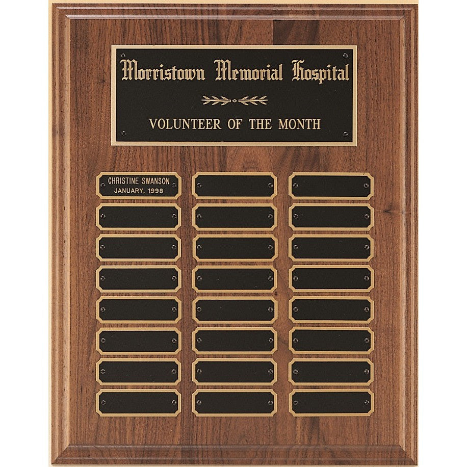 American Walnut perpetual plaque with 24 notched corner black brass plates, 9x12 inches.