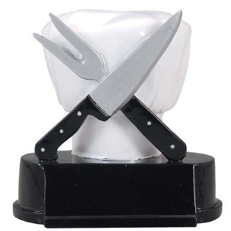 White chef's hat award with crossed silver knife and carving fork, on a black base with customizable plate.