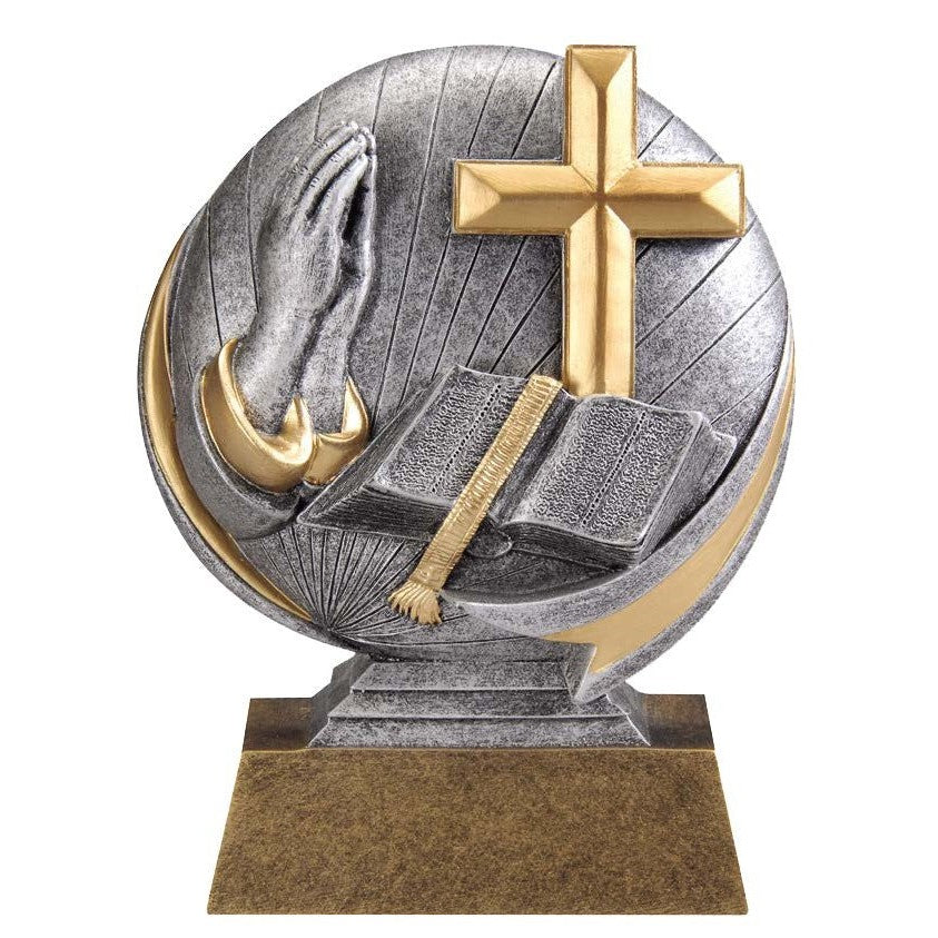 Silver and gold Motion X Circle of Excellence resin award with praying hands, cross, and open Bible.