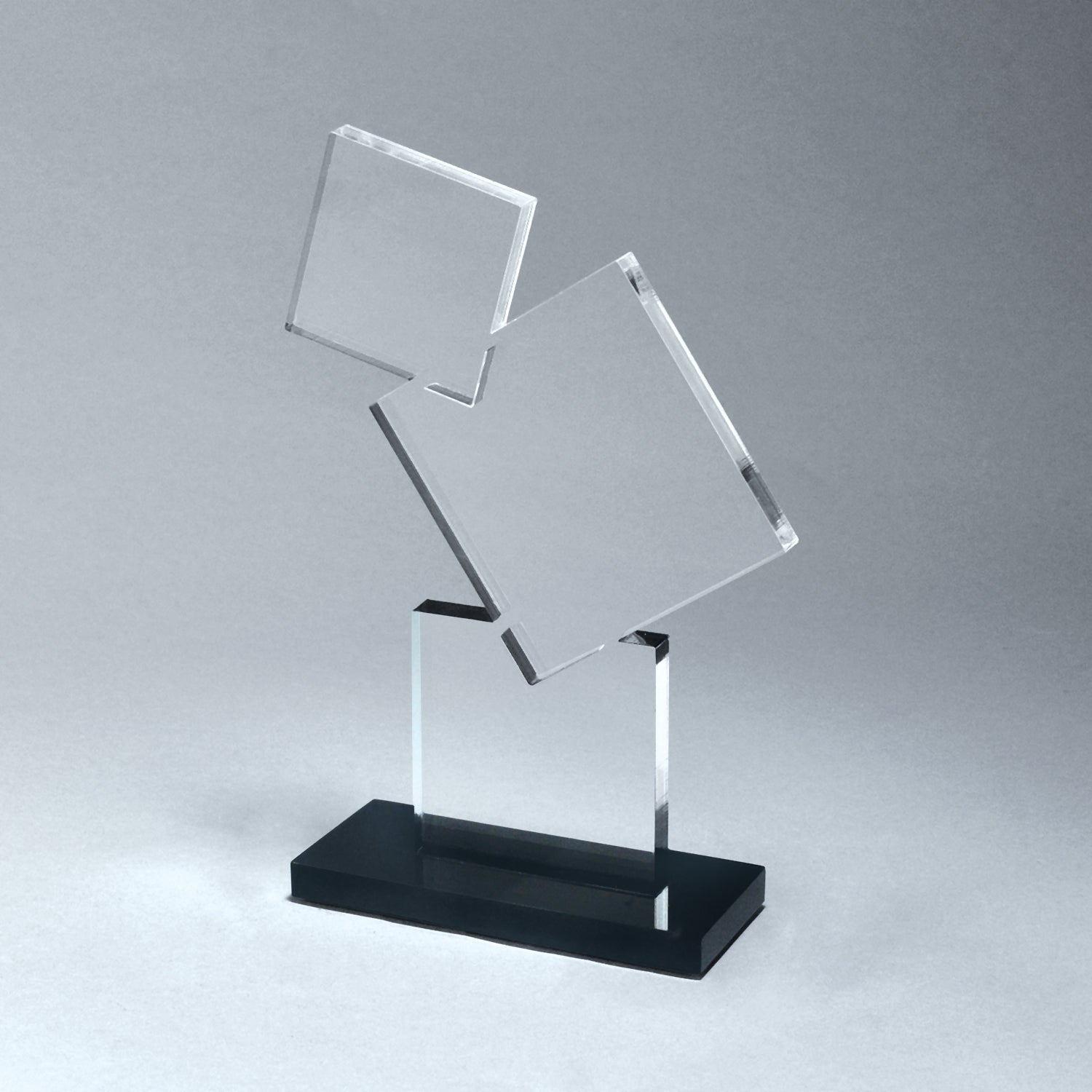 Clear stacked block award with two square acrylic blocks on a black acrylic base.