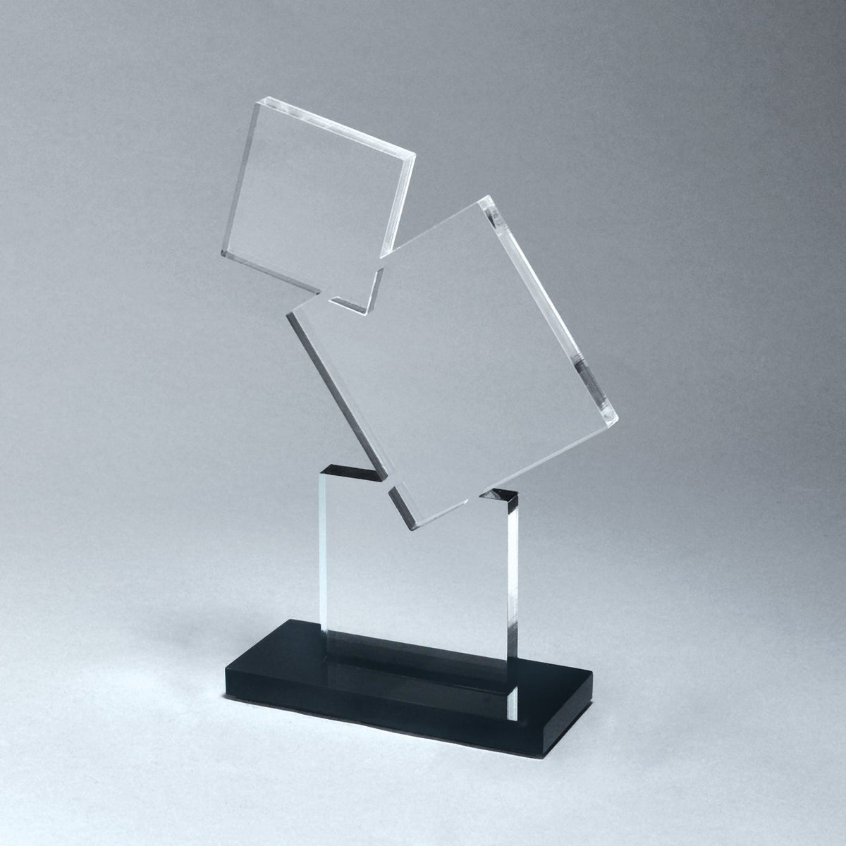 Clear stacked block award with two square acrylic blocks on a black acrylic base.