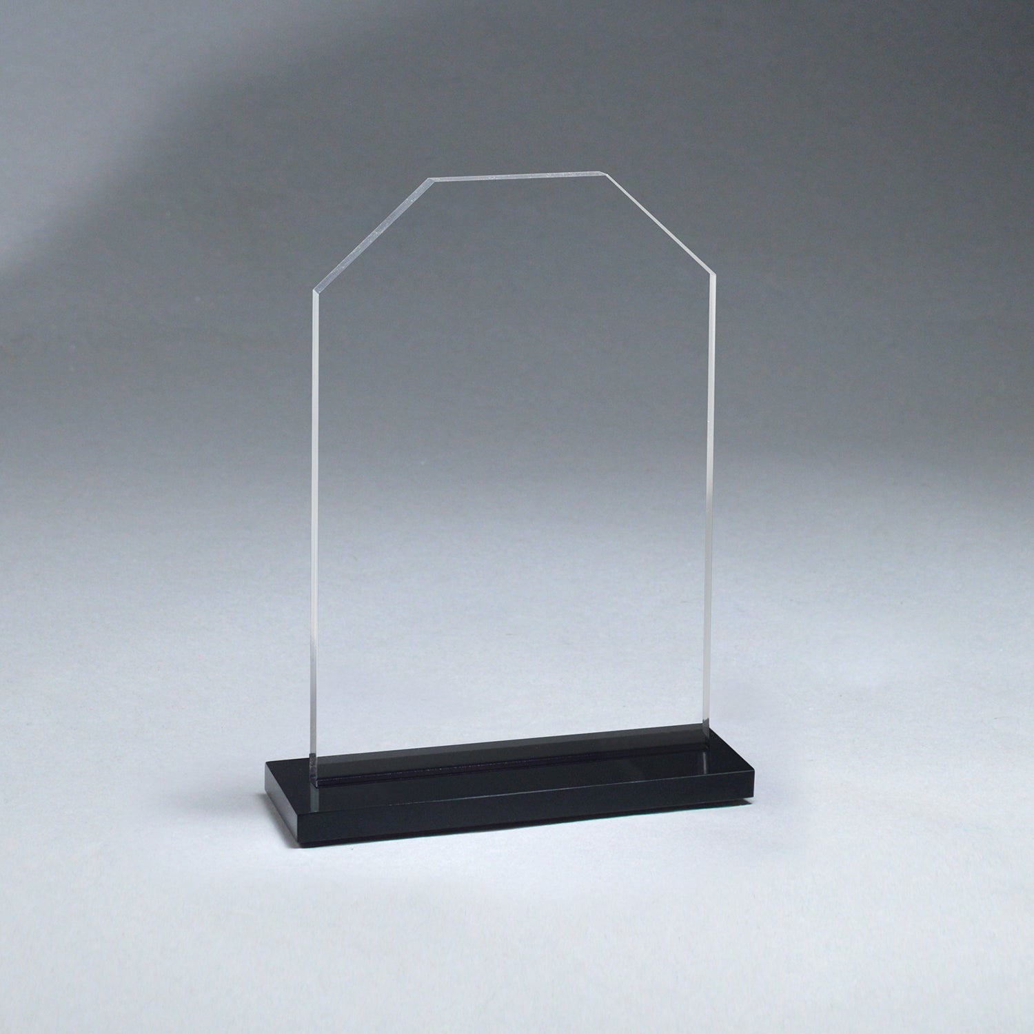 Clear acrylic Starfire Stone award, 7.5 inches tall, with a contemporary ebony acrylic base.
