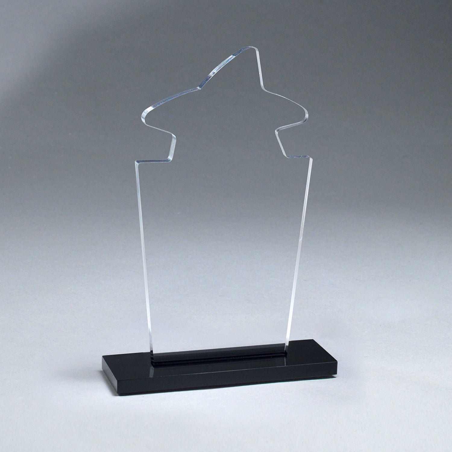 Clear acrylic 7.5" Starfire Star trophy with a pointed top and a contemporary black slotted base.