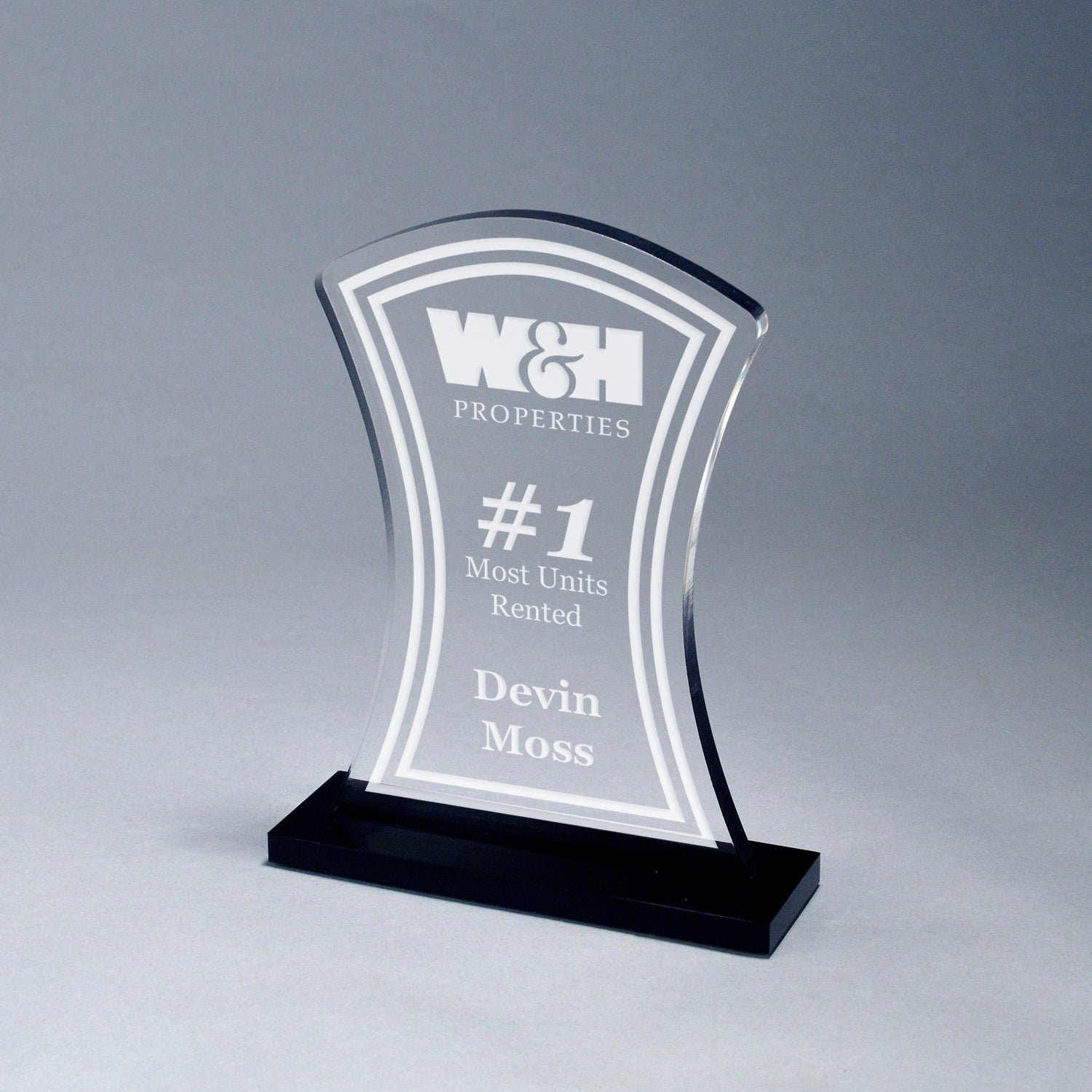 Starfire Acrylic Hour Glass Award, 7.5-inch clear acrylic with frosted personalization on an ebony base.