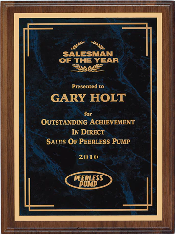 Executive walnut plaque with a dark blue marbled plate and gold text honoring "Salesman of the Year.