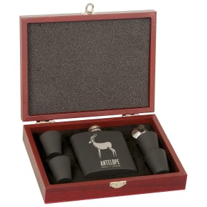 Rosewood finish flask set with a black flask featuring an antelope design, two shot glasses, and a funnel.