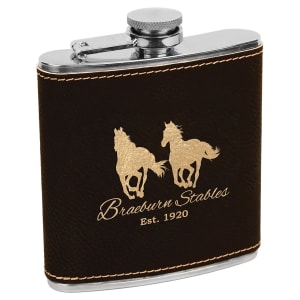 6 oz. dark brown laserable leatherette stainless steel flask with gold horse and "Braeburn Stables" engraving.