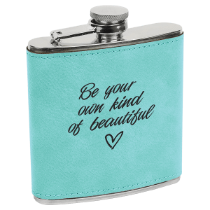 6 oz. laserable leatherette stainless steel flask in teal with "Be your own kind of beautiful" engraving.