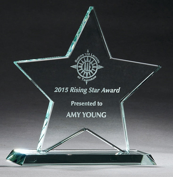 Clear crystal star award on a clear base, engraved with "2015 Rising Star Award Presented to AMY YOUNG".