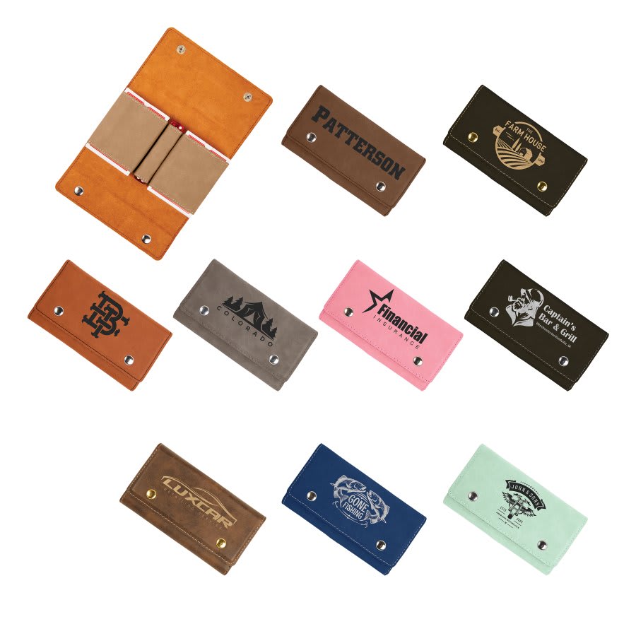 Assorted laserable leatherette card & dice sets in various colors with custom engravings and silver snaps.
