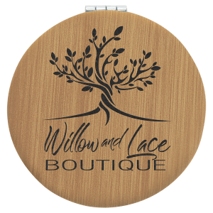 2 1/2" round light brown laserable leatherette compact mirror with a black tree and "Willow and Lace BOUTIQUE" engraving.