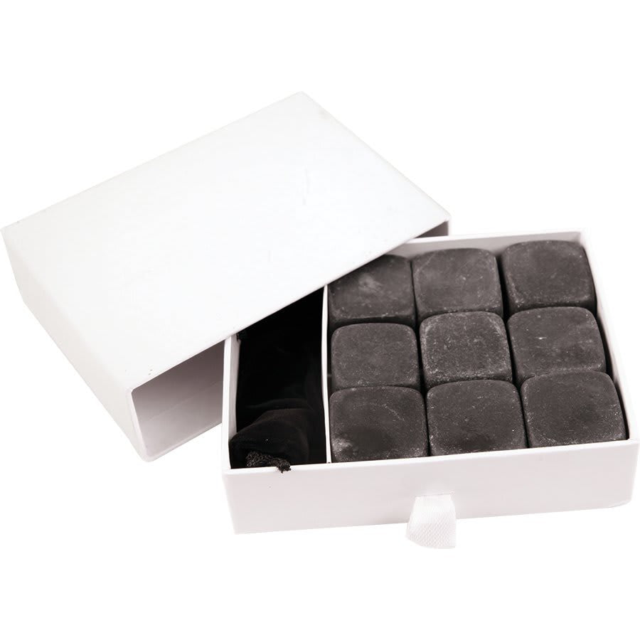 Nine dark gray basalt whiskey stones in a white gift box with a black velvet pouch.