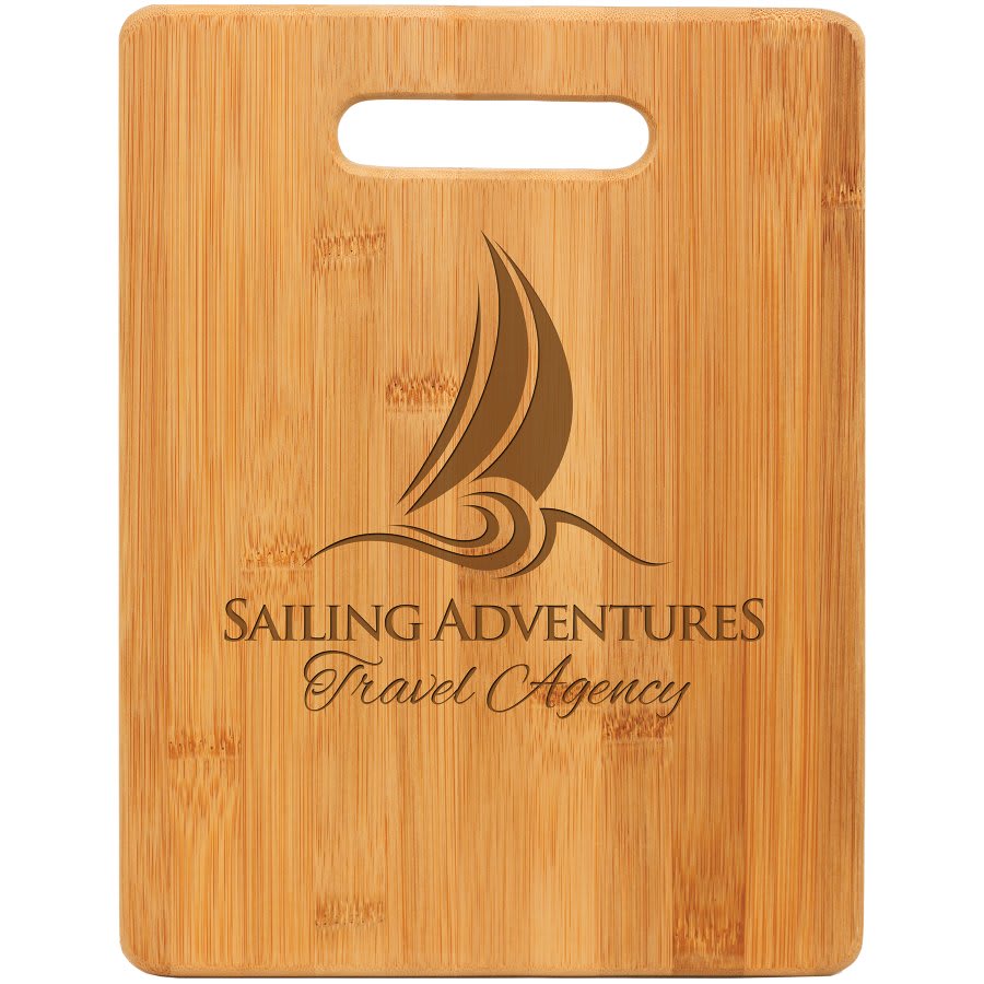 Rectangular bamboo cutting board with a handle, laser engraved with "Sailing Adventures Travel Agency" logo.