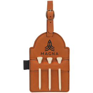 Tan laserable leatherette golf bag tag with "MAGNA" logo, three white wooden tees, and a buckle strap.