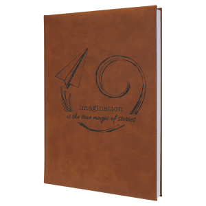 Brown 7"x9.75" laserable leatherette journal with "imagination is the true magic of stories" design.