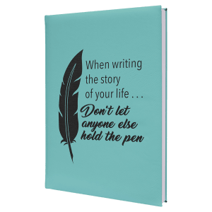 Teal leatherette journal with a black feather and inspirational quote.