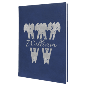 Navy blue 7" x 9 3/4" leatherette journal with a silver "William" monogram and "W" design.