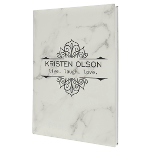White marble-patterned leatherette journal with "Kristen Olson live. laugh. love." engraved in black.
