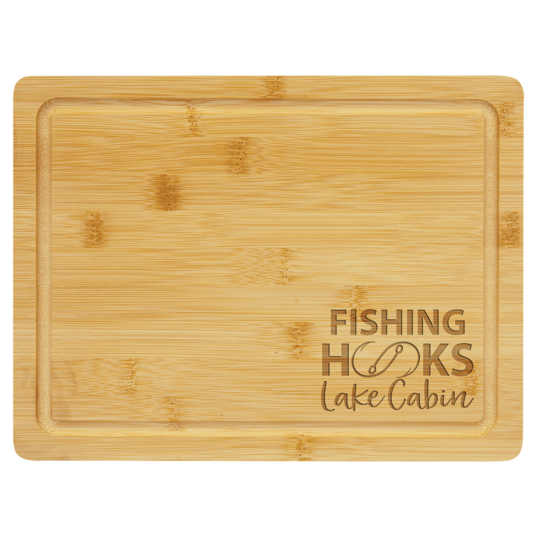 Light bamboo cutting board with drip ring and "Fishing Hooks Lake Cabin" engraved text.