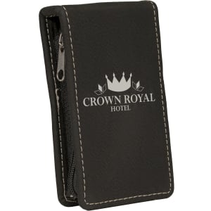 Black leatherette manicure gift set with white stitching and a silver zipper, featuring a "Crown Royal Hotel" logo.