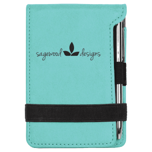 Teal laserable leatherette mini notepad (3 1/4" x 4 3/4") with a black elastic band, pen, and "sagewood designs" logo.