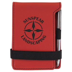 Red laserable leatherette mini notepad with "SUNSPEAR LANDSCAPING" logo, pen, and elastic band.