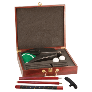 Open rosewood finish executive golf set with putter, two golf balls, putting cup, and putter pieces.