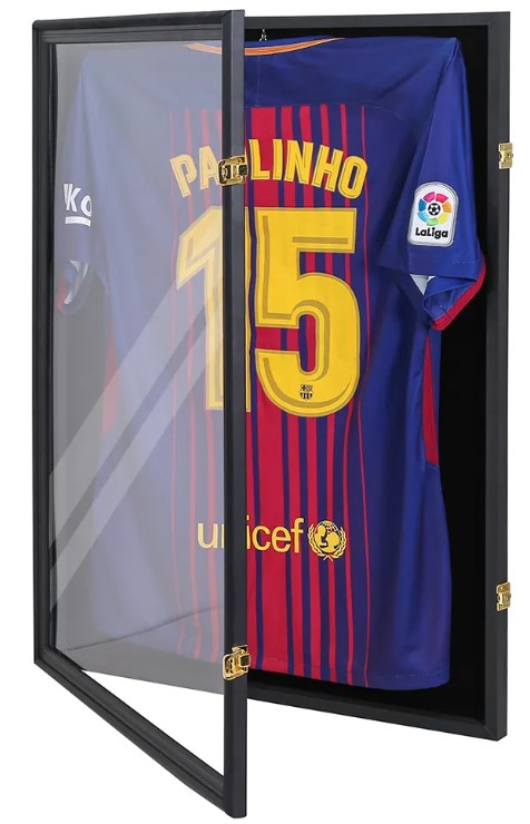Black 24"x32"x1.75" jersey display case with glass door, gold latches, hinges, and a blue soccer jersey inside.
