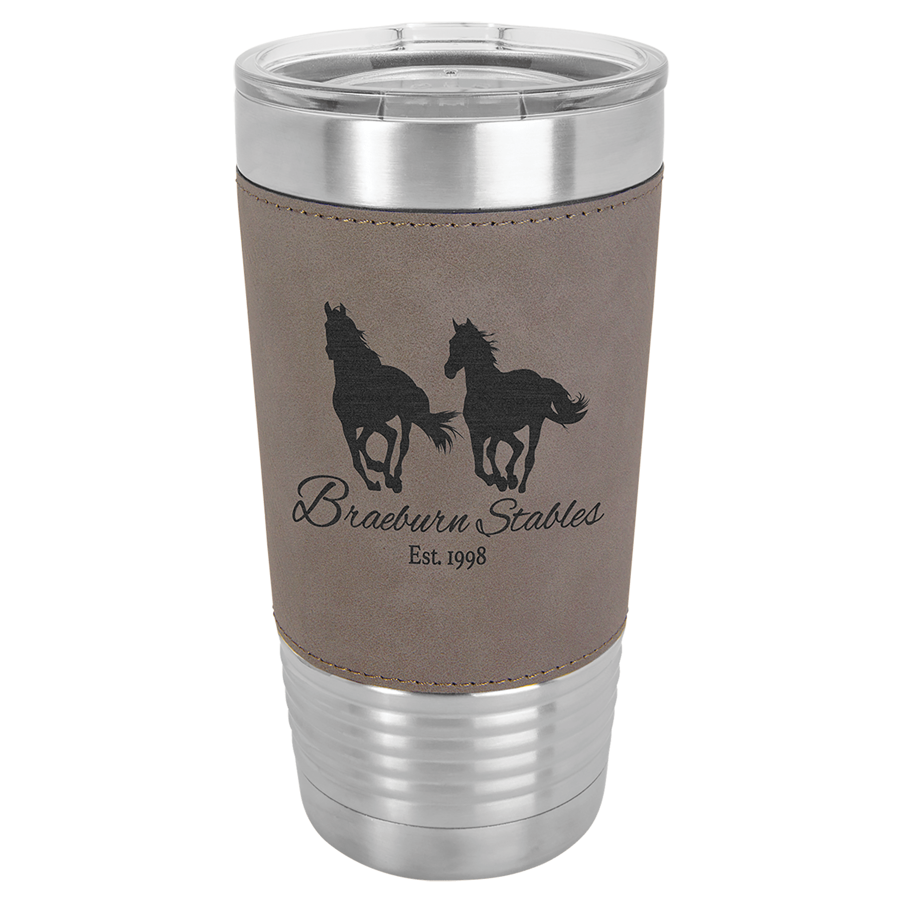 20 oz. light brown laserable leatherette tumbler with two running horses and "Braeburn Stables Est. 1998" engraving.