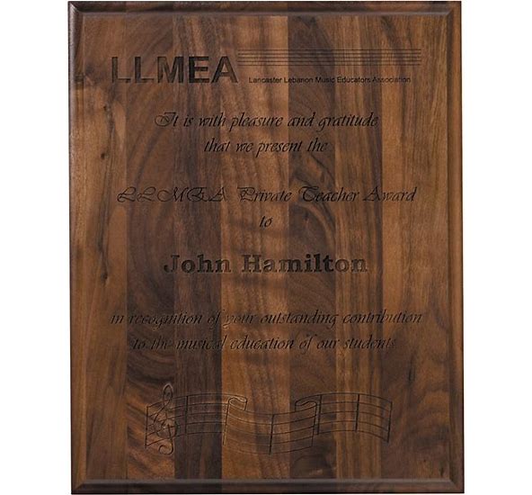 Dark executive walnut plaque with direct lasered text and musical note design.
