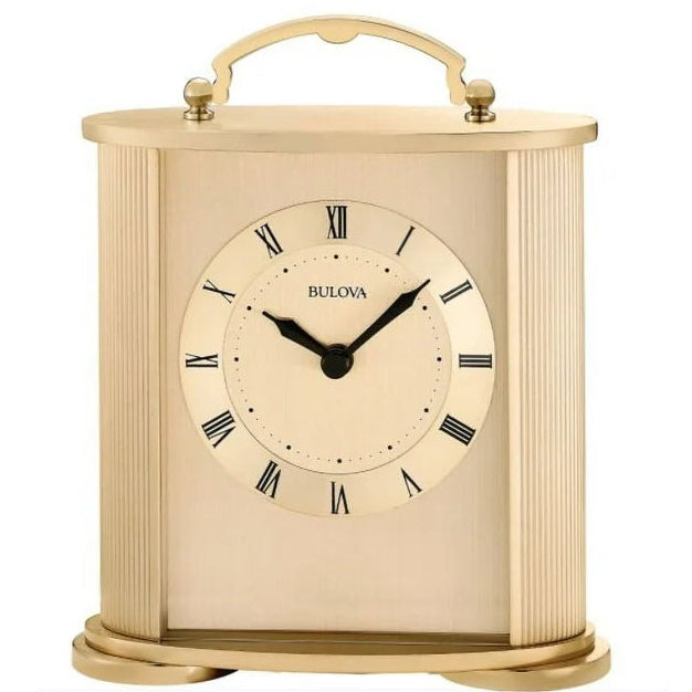 Gold Bulova clock with polished and brushed metal, curved ribbed accents, Roman numerals, and a top handle.