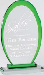 Green crystal oval award, 8.5" tall, with clear glass and green lining, engraved with "Sales Excellence.