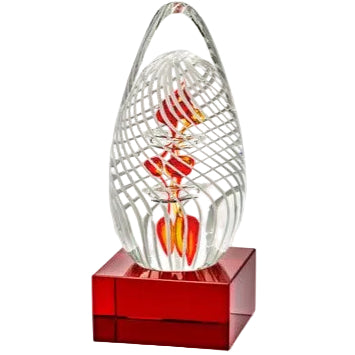 5-inch clear art glass egg award with white lattice and red shapes, on a red base.
