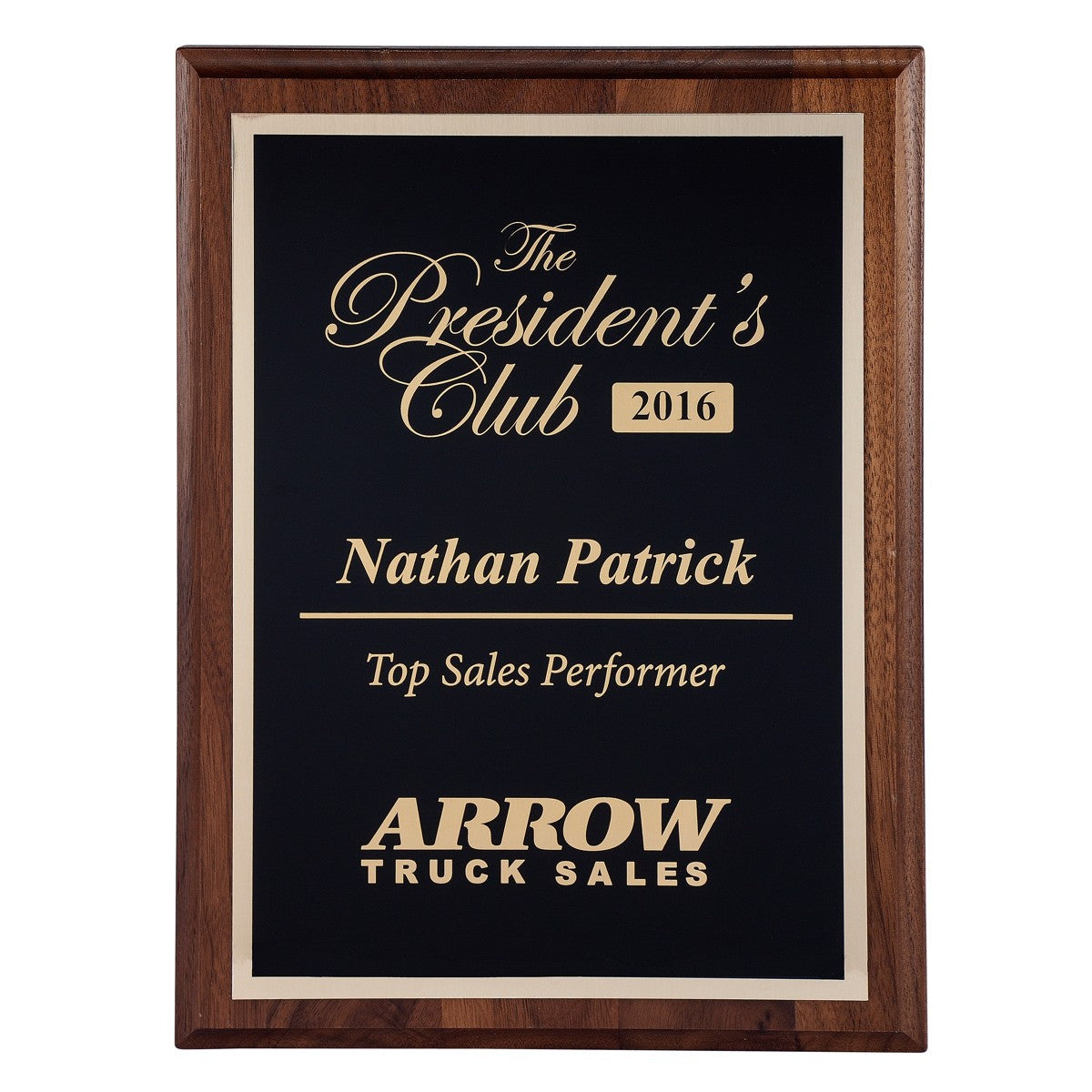 Executive walnut plaque with a black lasered plate, gold text, and a light wood border.