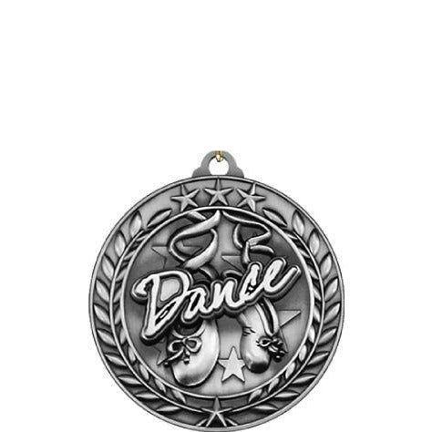 Silver antique medallion with "Dance" in script, ballet slippers, stars, and a wreath border.