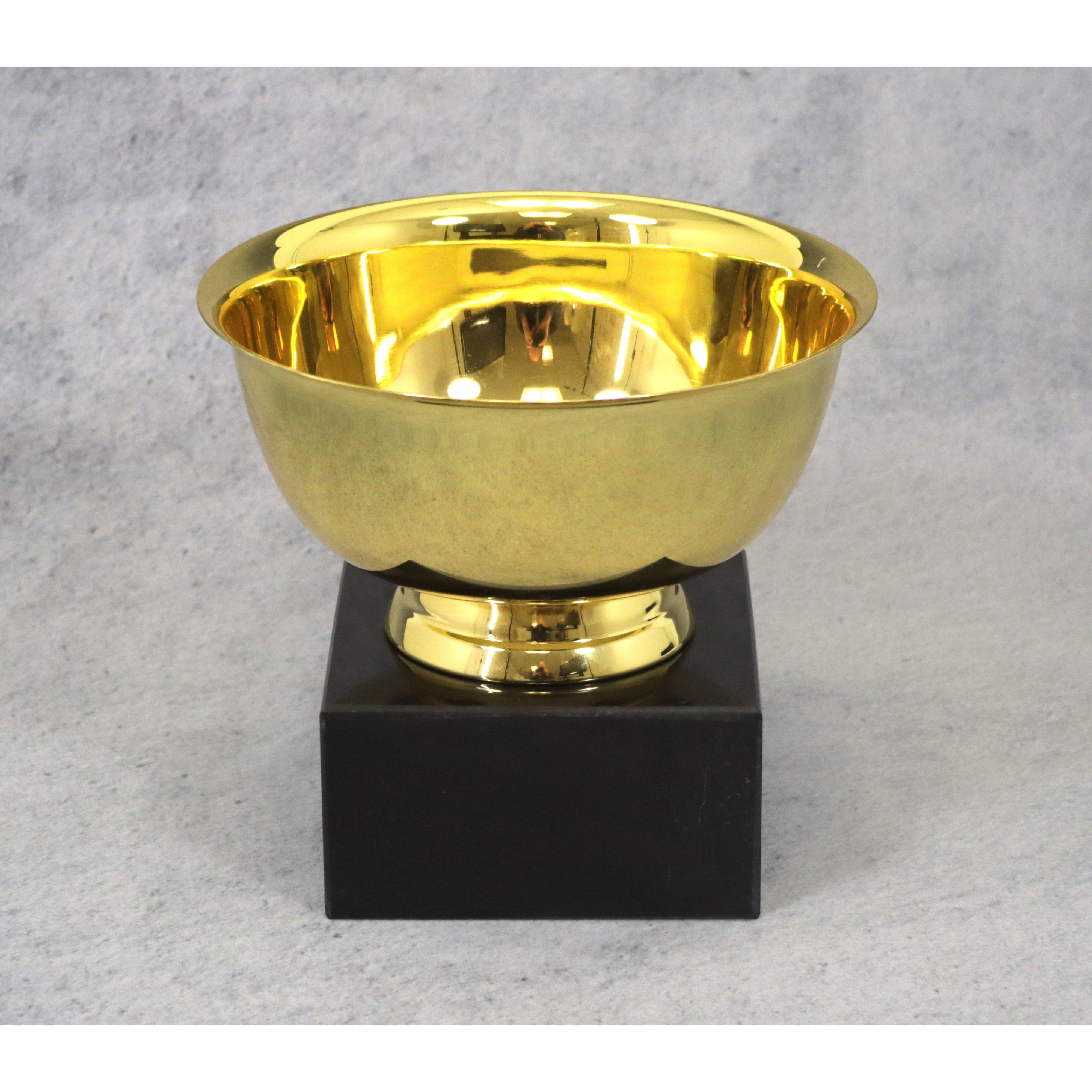 Elegant gold Revere bowl award on a rectangular black marble base, perfect for perpetual recognition.