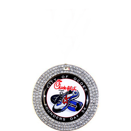 Silver glitter medal with rhinestone-like details, "City of Ocoee Founders Day 5K" text, and Chick-fil-A logo.