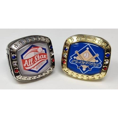 Two zinc alloy Valor Rings, one silver "All Star" and one gold "Champions," both with baseball themes.