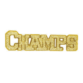 Gold chenille pin spelling "CHAMPS" in a textured, glittery finish.