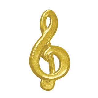Gold chenille pin in the shape of a treble clef, recognizing musical achievement.