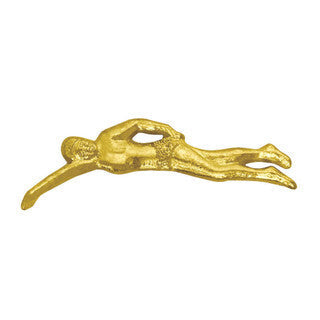 Gold swimmer chenille pin, a varsity award for athletic success.