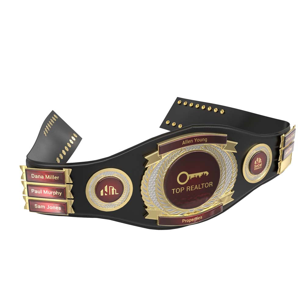 Black leather championship belt with gold trim, red medallions, and customizable name plates.