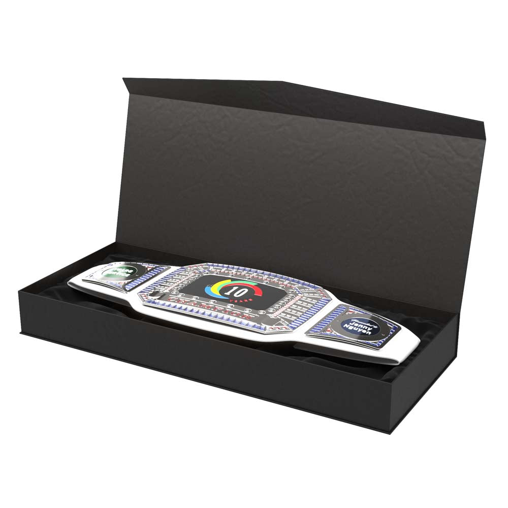 White championship award belt with synthetic gemstones and gold trim, displayed in a black presentation box.