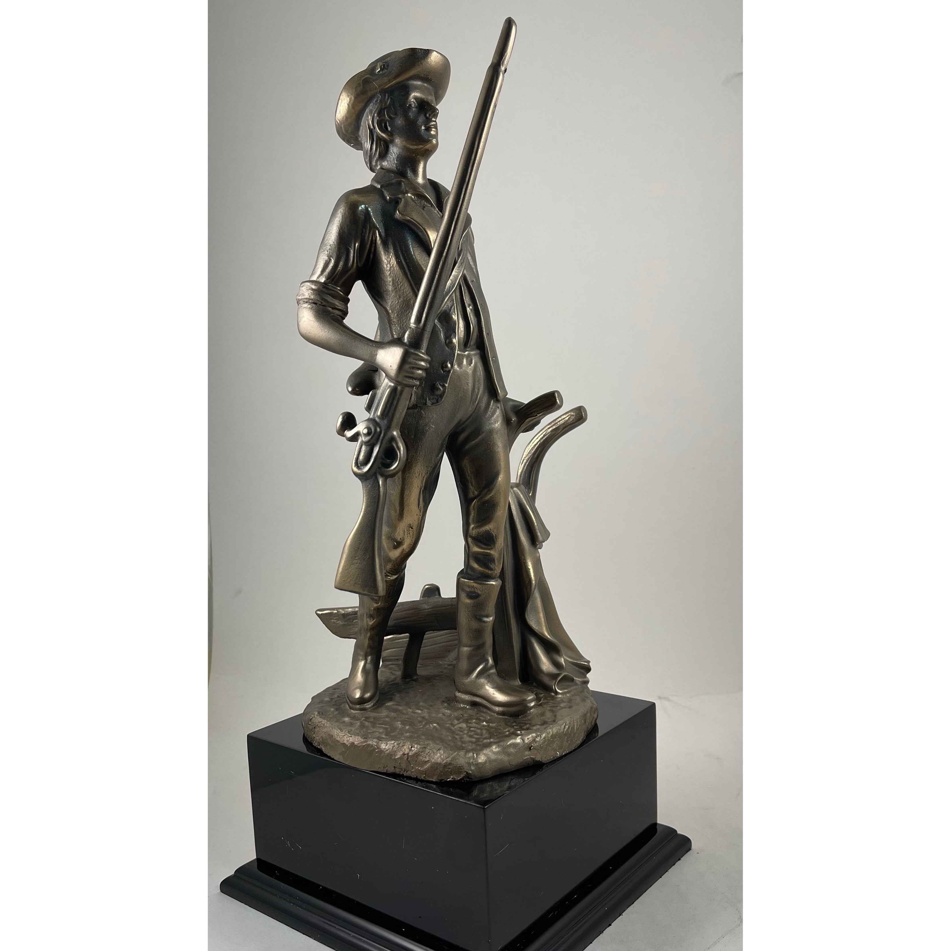 Bronze Minuteman statue, 9.5" or 14", on a sleek ebony base with a personalized plate.