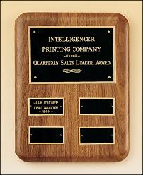 Wooden plaque, 10x8", with a large header plate and four smaller perpetual plates.